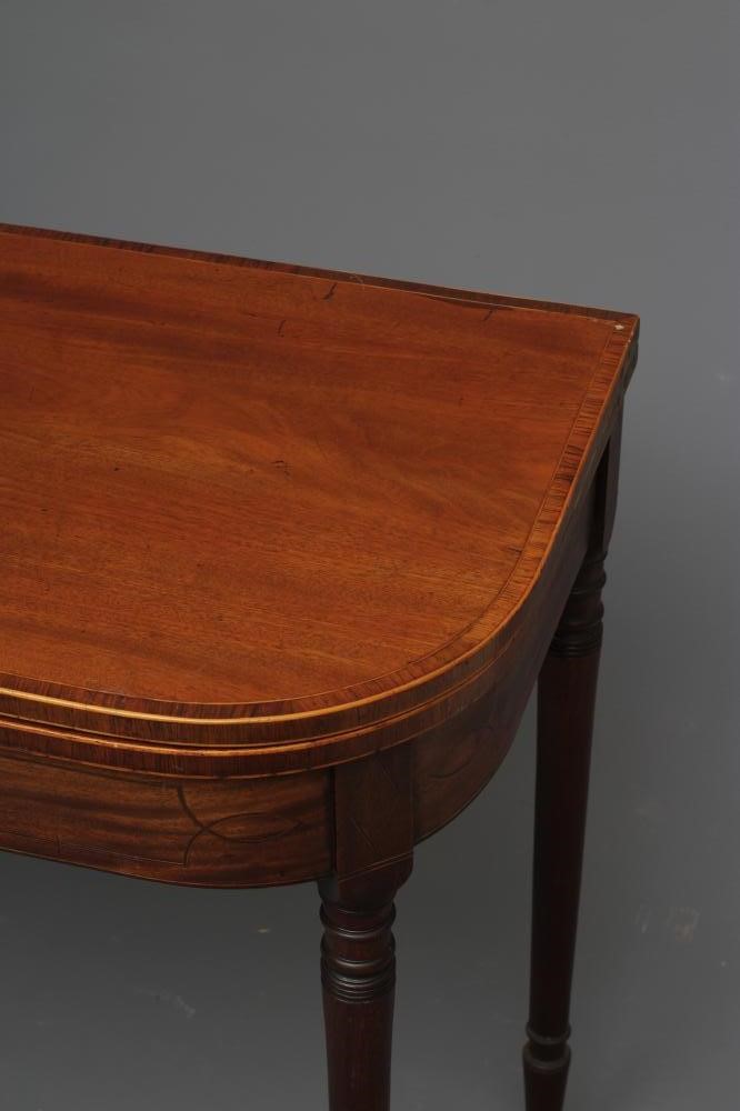 A GEORGIAN MAHOGANY FOLDING TEA TABLE Image