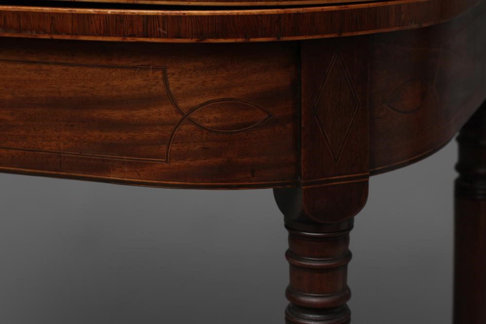 A GEORGIAN MAHOGANY FOLDING TEA TABLE Image