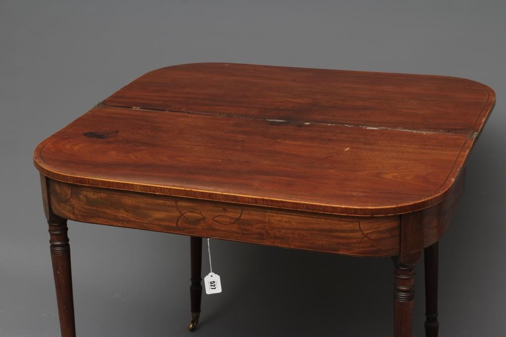 A GEORGIAN MAHOGANY FOLDING TEA TABLE Image