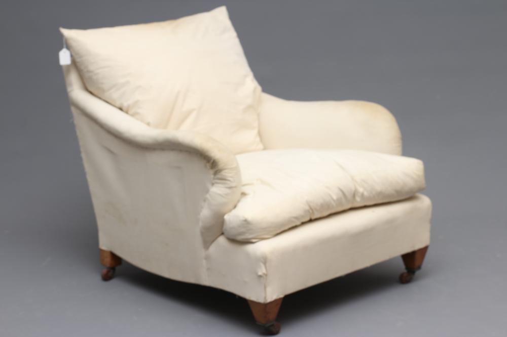 AN EDWARDIAN MAHOGANY ARMCHAIR in the manner of Howard Image