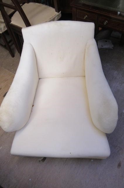 AN EDWARDIAN MAHOGANY ARMCHAIR in the manner of Howard Image