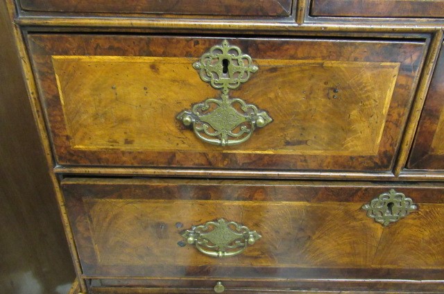 A WALNUT CHEST ON STAND Image