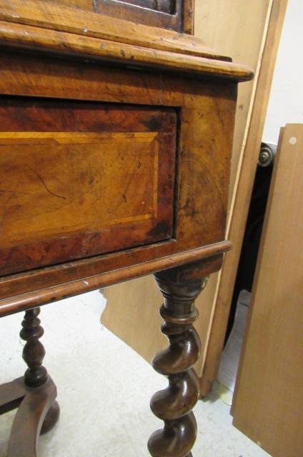 A WALNUT CHEST ON STAND Image