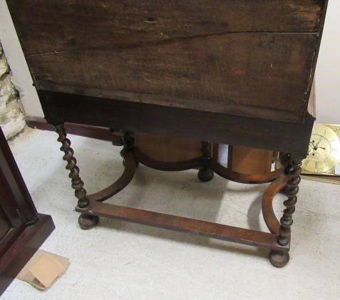 A WALNUT CHEST ON STAND Image