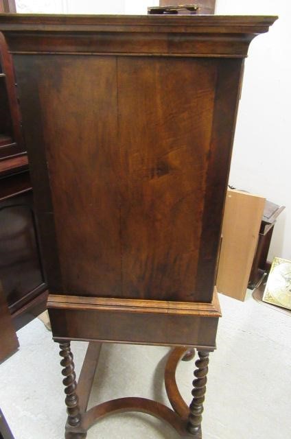 A WALNUT CHEST ON STAND Image