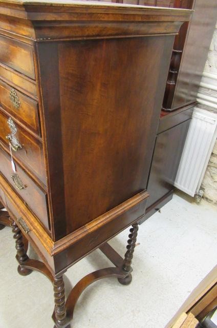 A WALNUT CHEST ON STAND Image