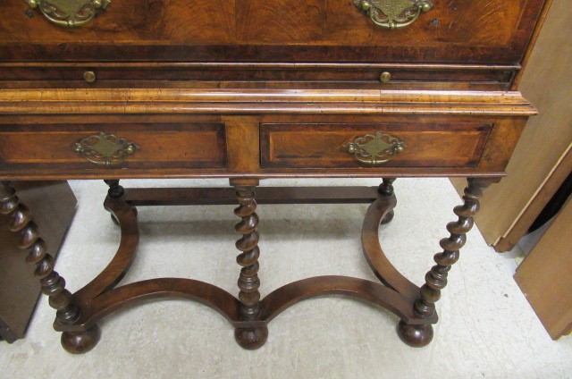 A WALNUT CHEST ON STAND Image