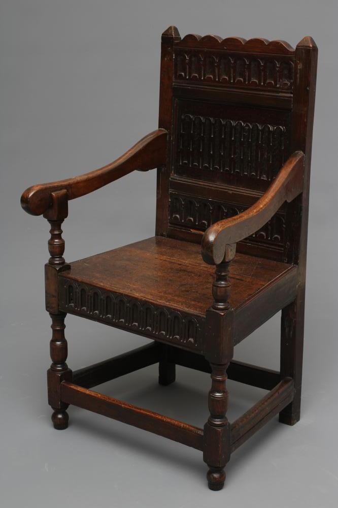 A JOINED OAK ARMCHAIR Image