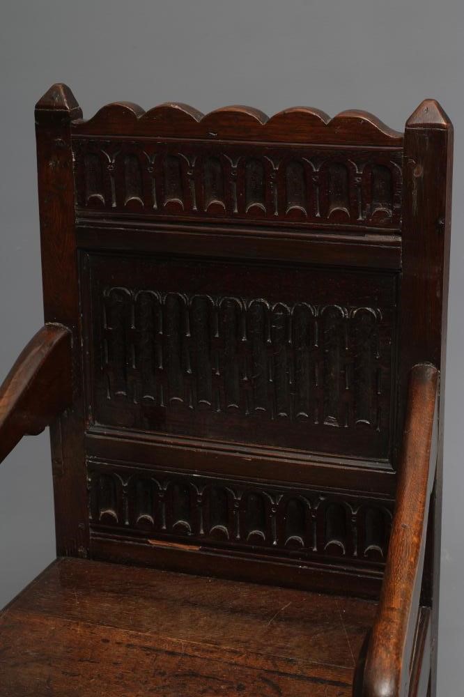 A JOINED OAK ARMCHAIR Image