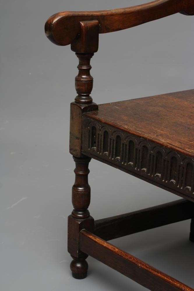 A JOINED OAK ARMCHAIR Image