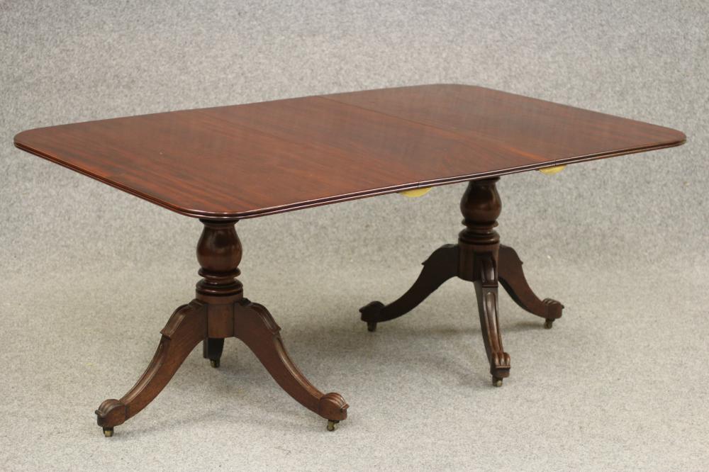 A WILLIAM IV MAHOGANY TWIN PEDESTAL DINING TABLE with a single leaf Image