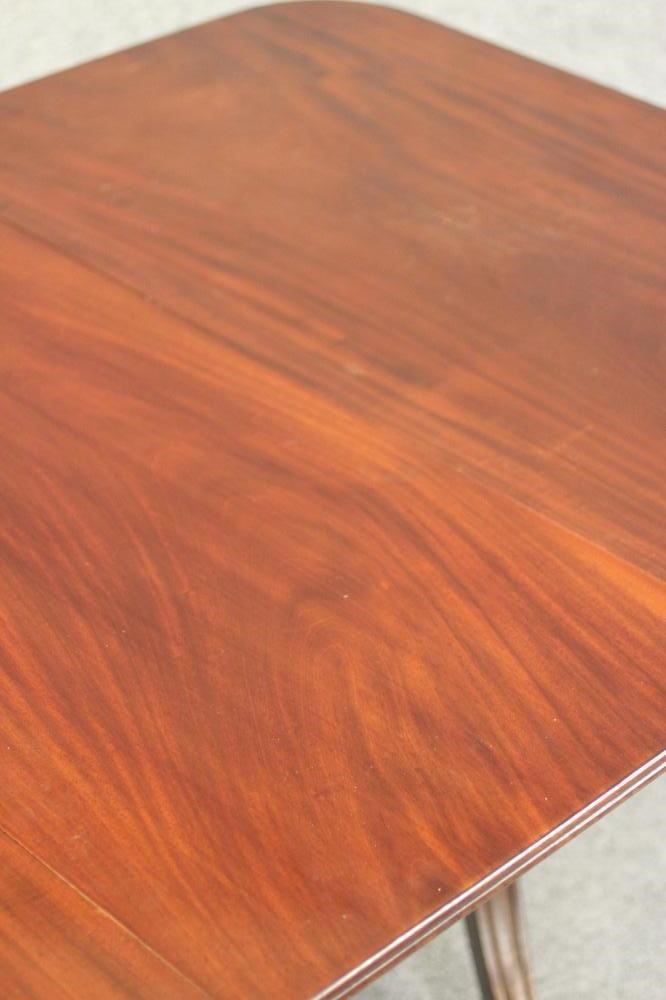 A WILLIAM IV MAHOGANY TWIN PEDESTAL DINING TABLE with a single leaf Image