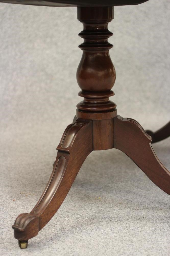 A WILLIAM IV MAHOGANY TWIN PEDESTAL DINING TABLE with a single leaf Image