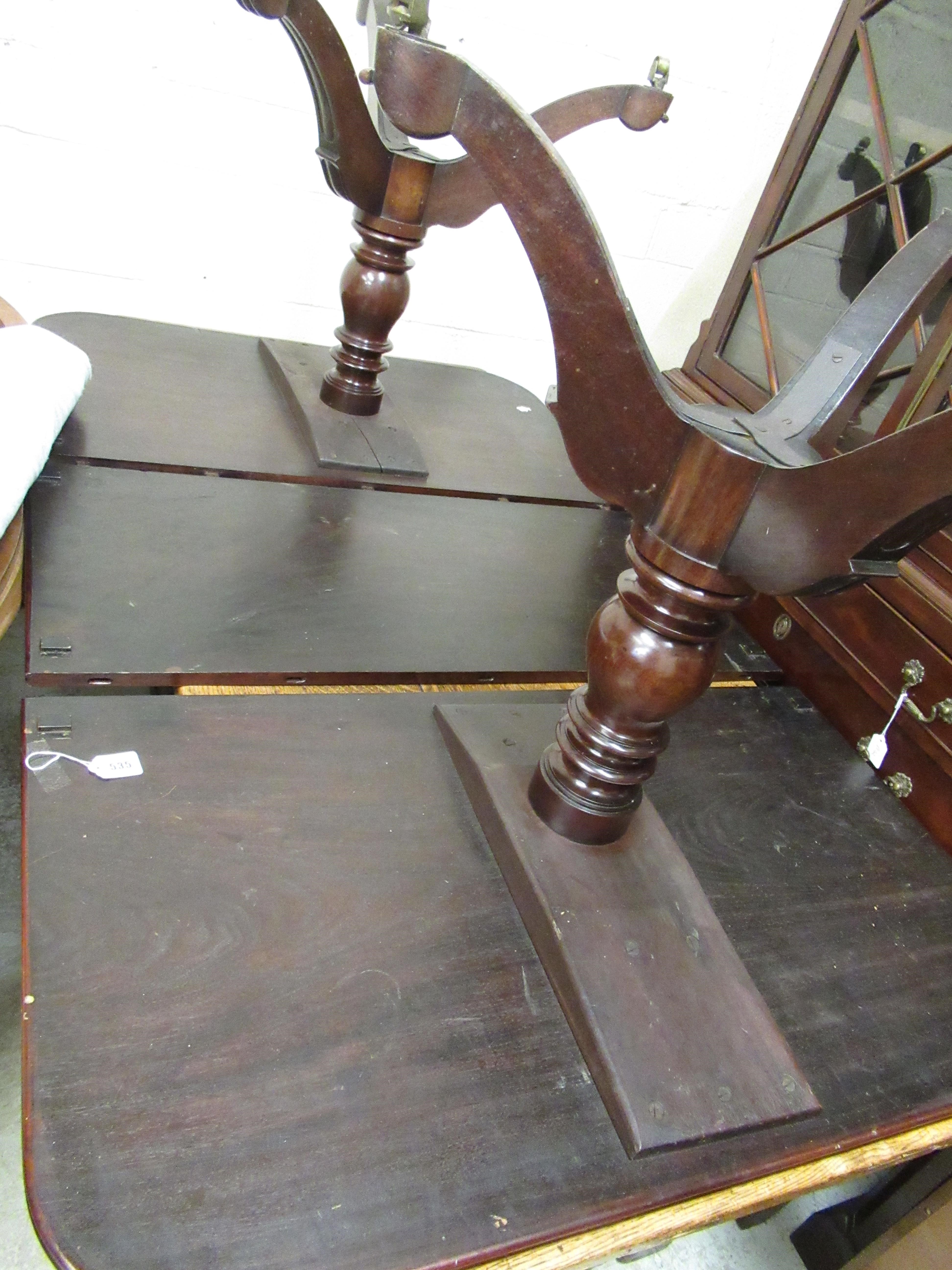 A WILLIAM IV MAHOGANY TWIN PEDESTAL DINING TABLE with a single leaf Image