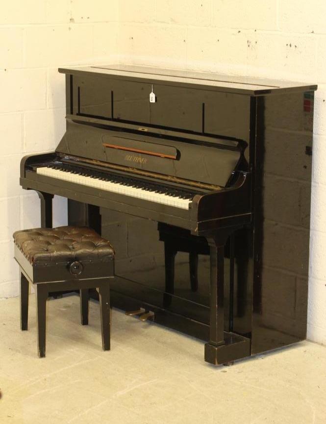 A BLUTHNER UPRIGHT PIANO. c.1925 Image