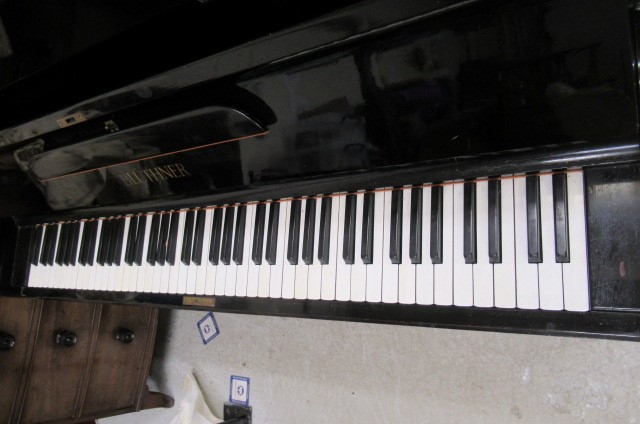 A BLUTHNER UPRIGHT PIANO. c.1925 Image