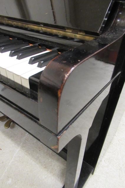 A BLUTHNER UPRIGHT PIANO. c.1925 Image