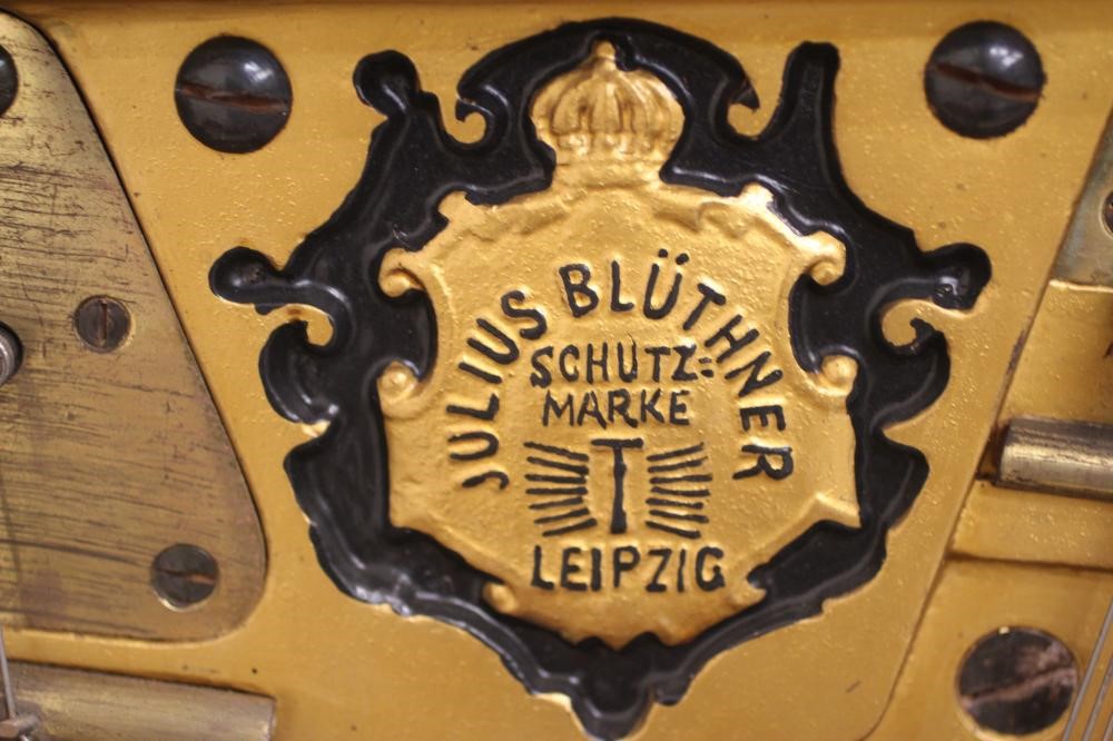 A BLUTHNER UPRIGHT PIANO. c.1925 Image