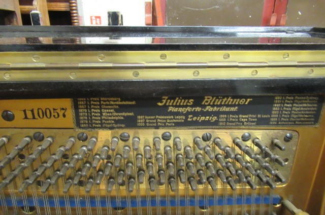 A BLUTHNER UPRIGHT PIANO. c.1925 Image