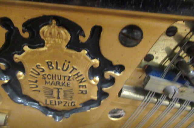 A BLUTHNER UPRIGHT PIANO. c.1925 Image