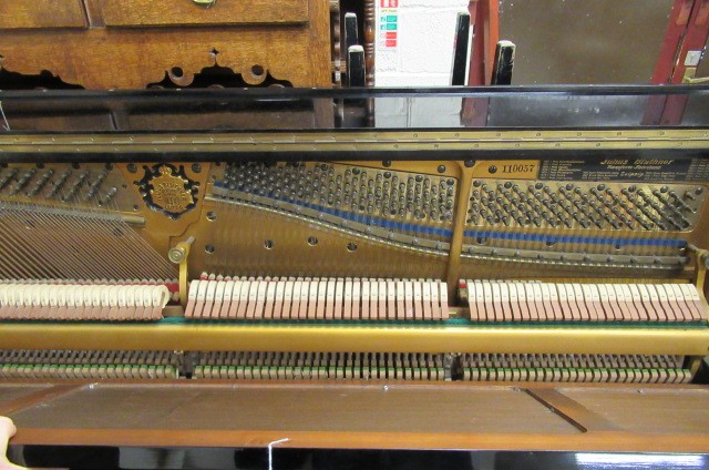 A BLUTHNER UPRIGHT PIANO. c.1925 Image