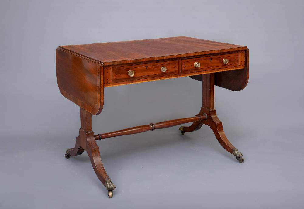 A REGENCY MAHOGANY AND ROSEWOOD BANDED SOFA TABLE Image