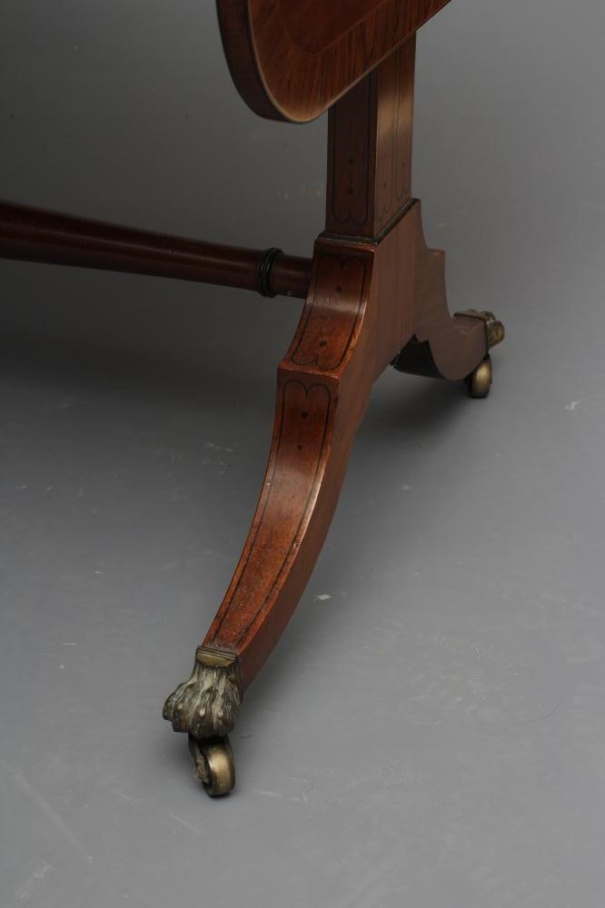 A REGENCY MAHOGANY AND ROSEWOOD BANDED SOFA TABLE Image