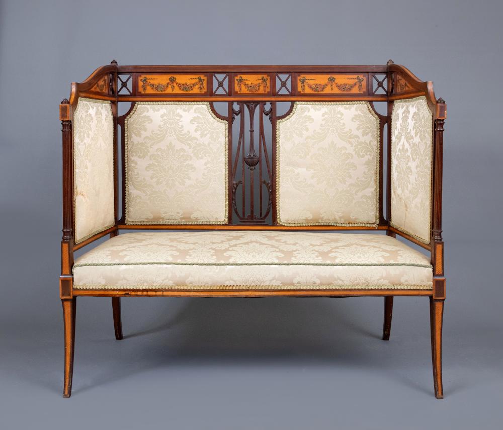 AN EDWARDIAN MAHOGANY HIGH SIDED SETTEE Image
