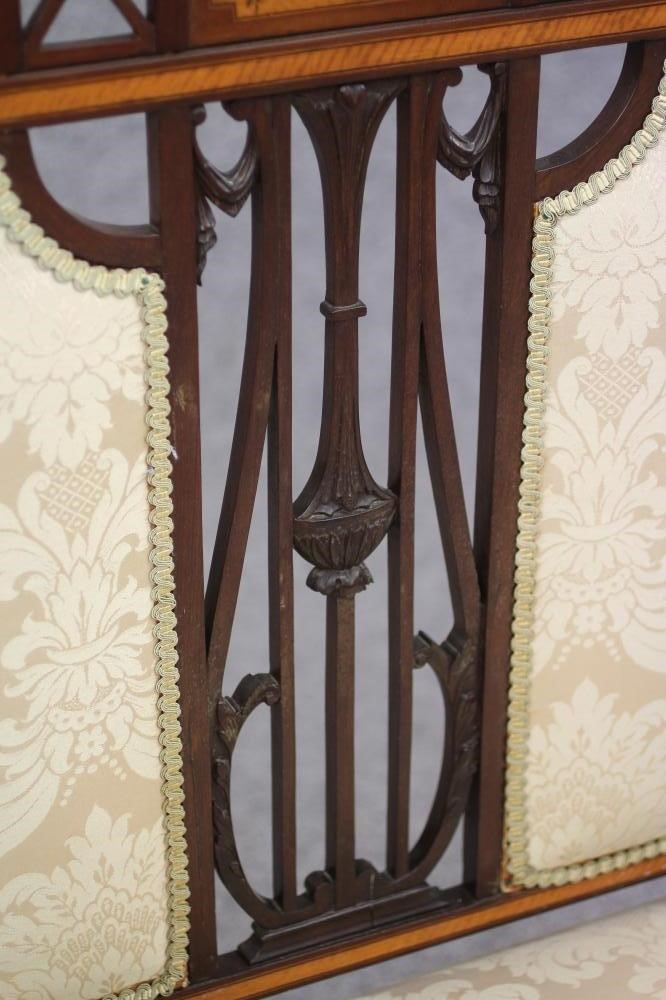 AN EDWARDIAN MAHOGANY HIGH SIDED SETTEE Image