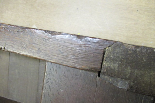 AN OAK PANELLED COFFER Image