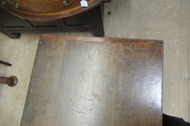 AN OAK PANELLED COFFER Image