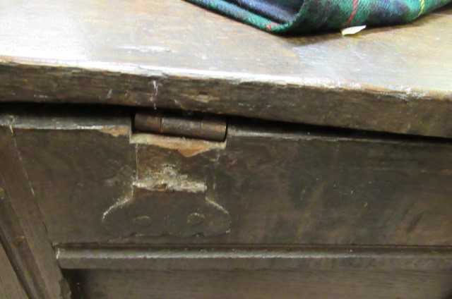 AN OAK PANELLED COFFER Image