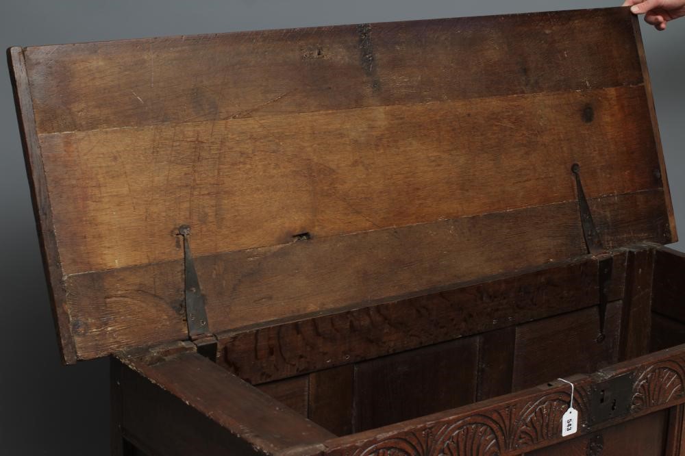 AN OAK PANELLED COFFER Image