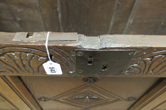 AN OAK PANELLED COFFER Image