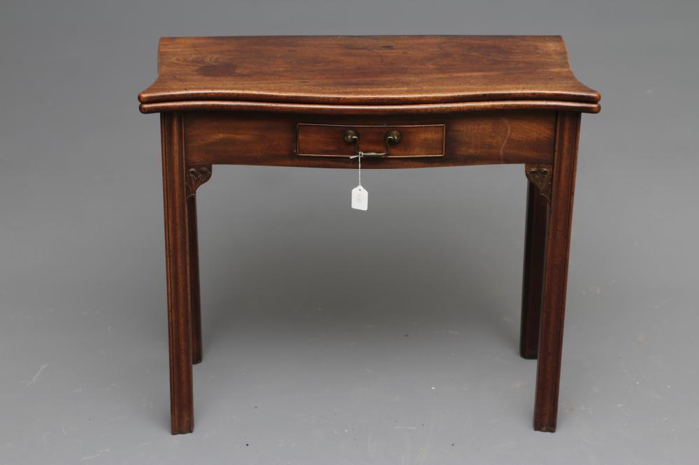 A GEORGIAN MAHOGANY FOLDING TEA TABLE Image