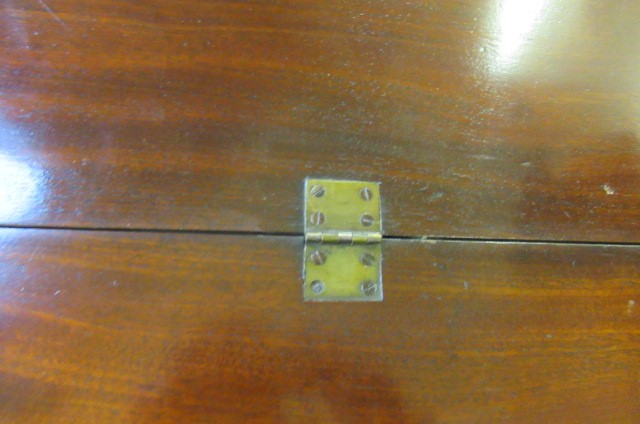 A GEORGIAN MAHOGANY FOLDING TEA TABLE Image