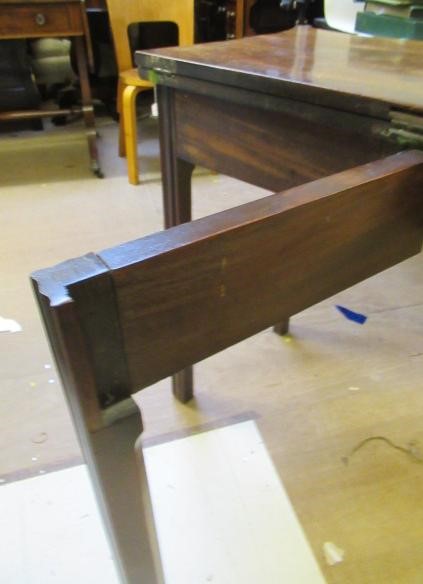 A GEORGIAN MAHOGANY FOLDING TEA TABLE Image