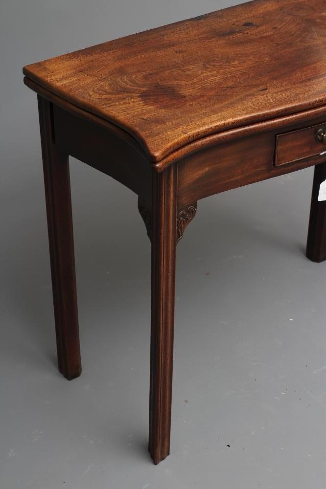 A GEORGIAN MAHOGANY FOLDING TEA TABLE Image