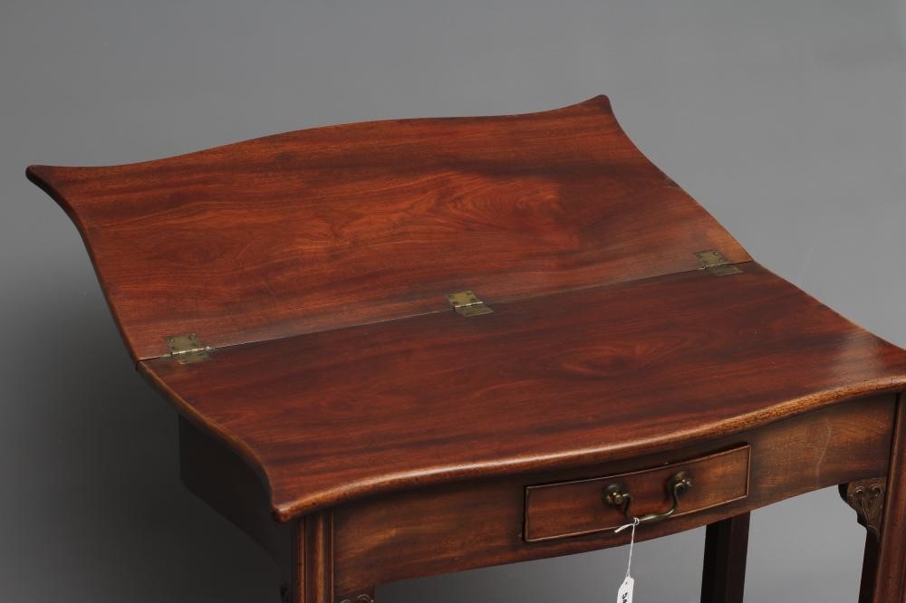 A GEORGIAN MAHOGANY FOLDING TEA TABLE Image