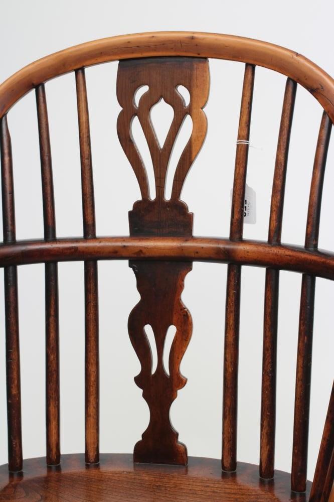 A YEW WINDSOR ARMCHAIR Image