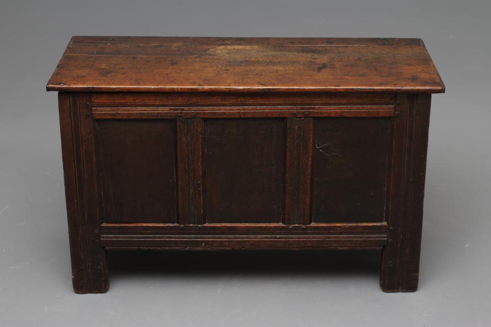 A JOINED OAK PANELLED COFFER Image