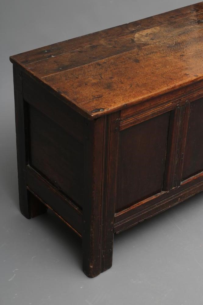 A JOINED OAK PANELLED COFFER Image