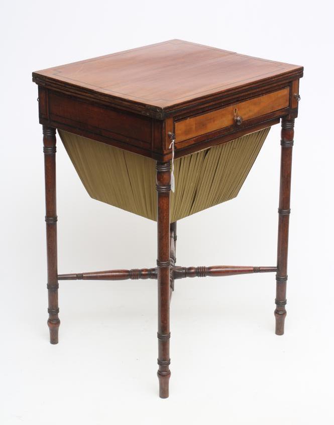 A REGENCY MAHOGANY SEWING TABLE Image