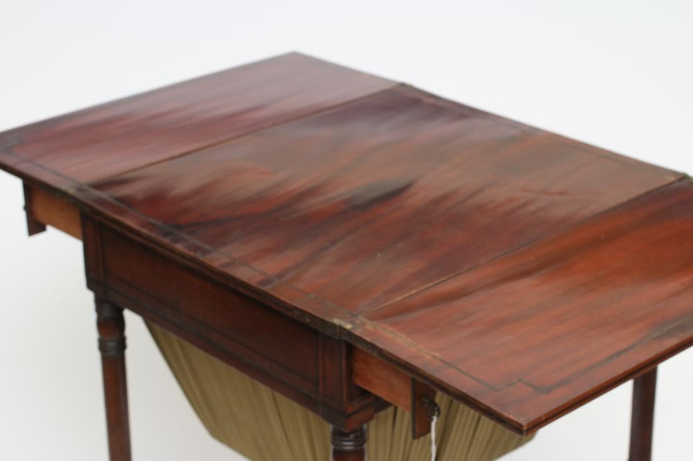 A REGENCY MAHOGANY SEWING TABLE Image