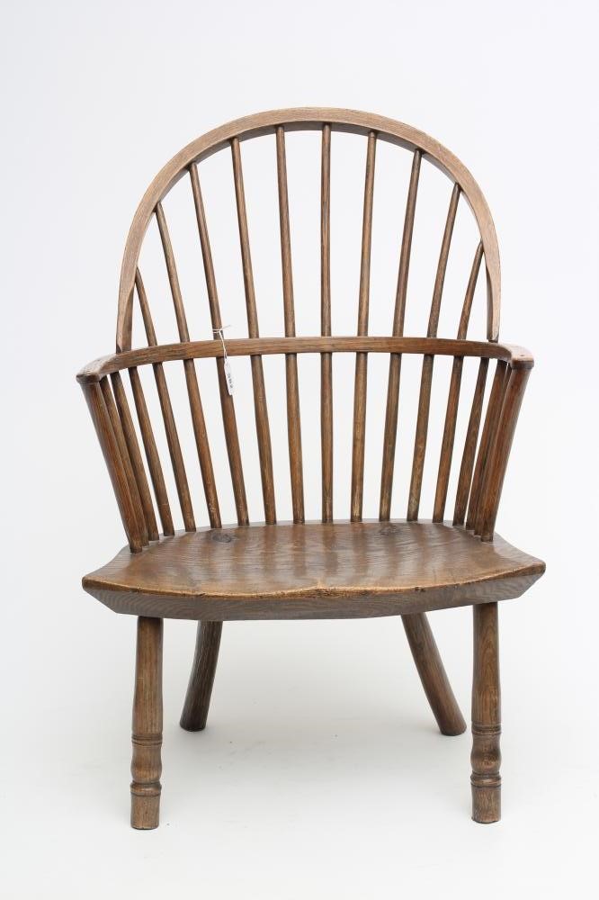 A WINDSOR SPINDLE BACK ARMCHAIR in ash and elm Image
