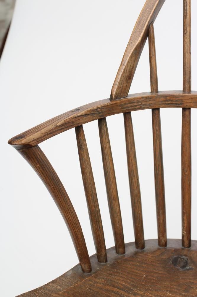 A WINDSOR SPINDLE BACK ARMCHAIR in ash and elm Image