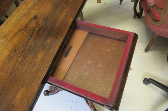 A PAIR OF EARLY VICTORIAN ROSEWOOD FOLDING TEA TABLES Image