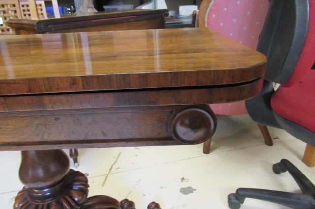 A PAIR OF EARLY VICTORIAN ROSEWOOD FOLDING TEA TABLES Image