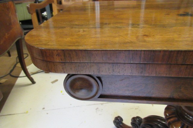 A PAIR OF EARLY VICTORIAN ROSEWOOD FOLDING TEA TABLES Image