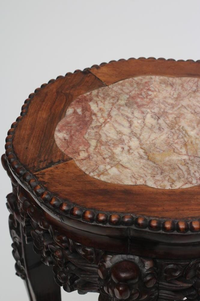 A CHINESE PADOUK WOOD JARDINIERE STAND Image